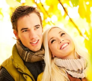 Young man and woman in the park.