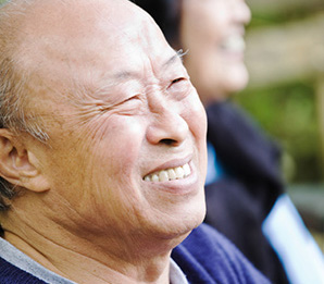 Senior Asian couple smiling